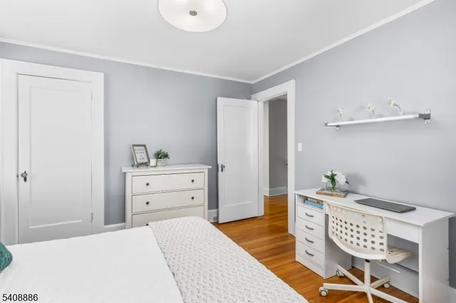 a bedroom with a bed and furniture