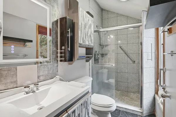 a view of a balcony and wooden floor