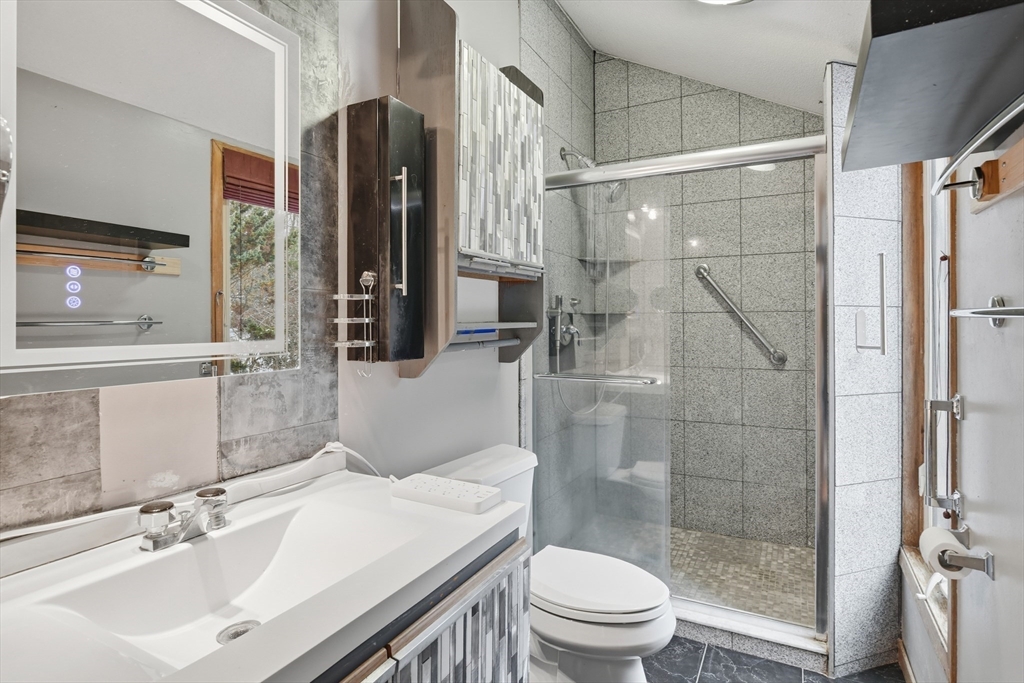 190 Dunhamtown Palmer Road Brimfield, MA 01010 - Photo 26 of 42 a bathroom with a sink toilet and shower