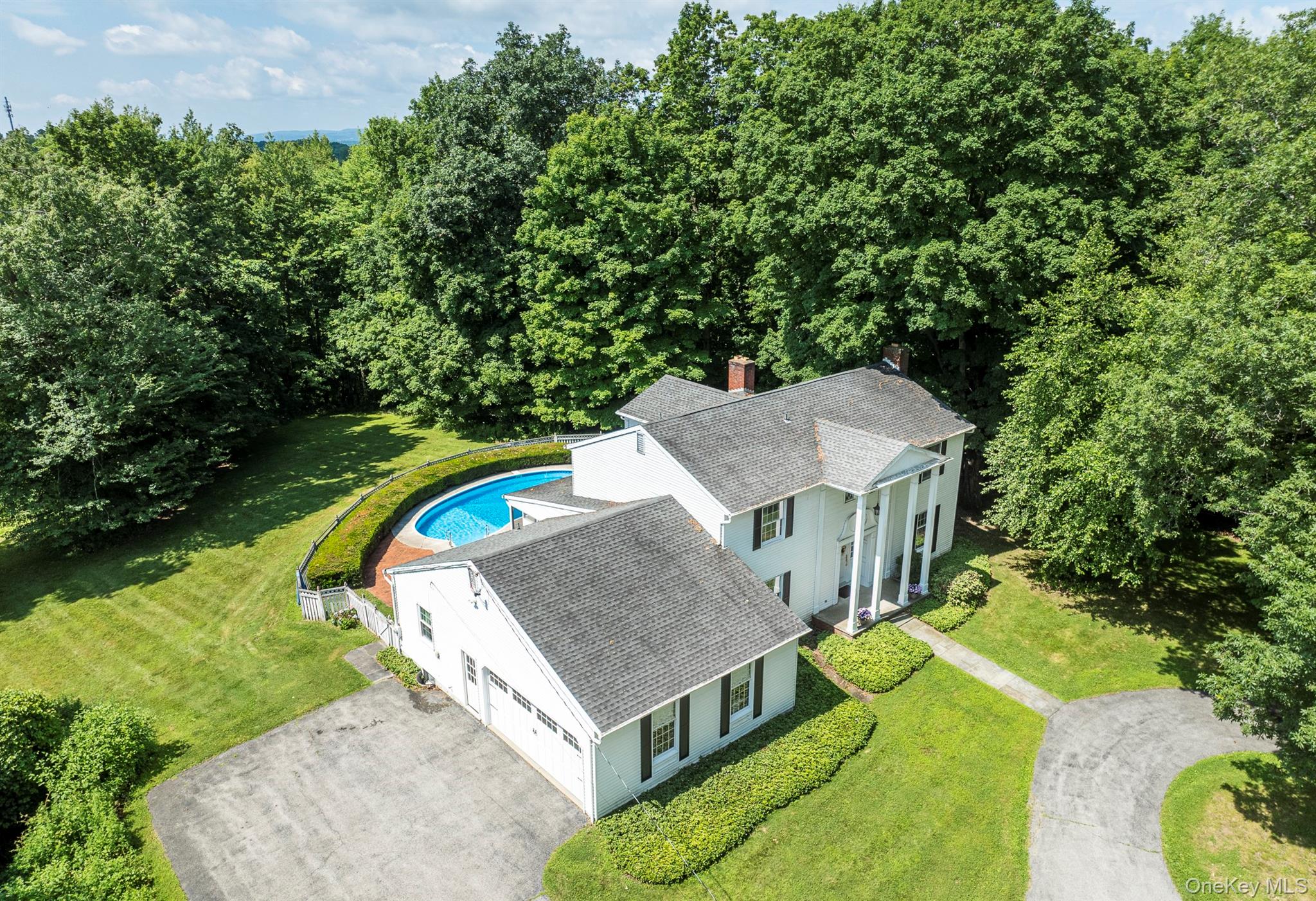 75 Hornbeck Road Poughkeepsie, NY 12603 - Photo 2 of 36 an aerial view of a house with a swimming pool