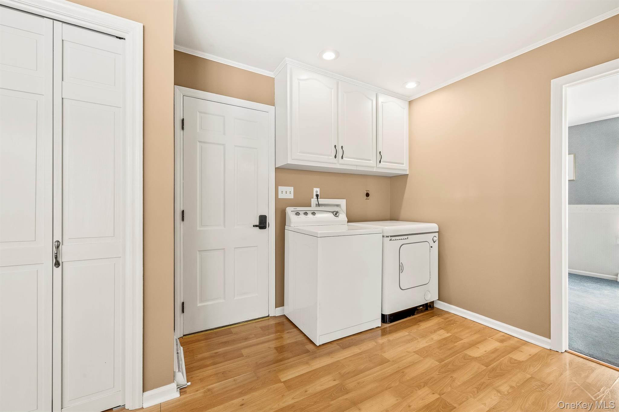 75 Hornbeck Road Poughkeepsie, NY 12603 - Photo 24 of 36 a view of a kitchen with white cabinets