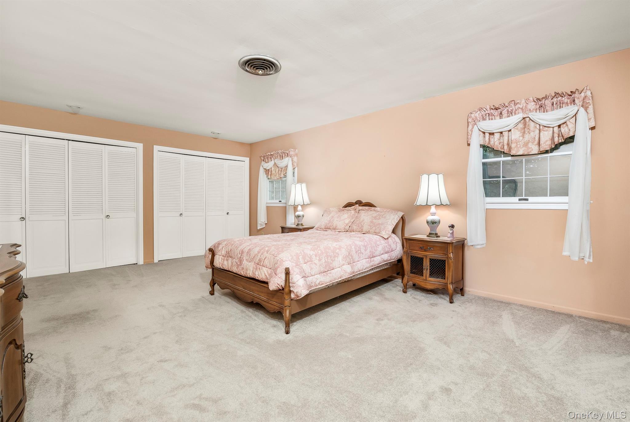 75 Hornbeck Road Poughkeepsie, NY 12603 - Photo 25 of 36 a bedroom with a bed and a window