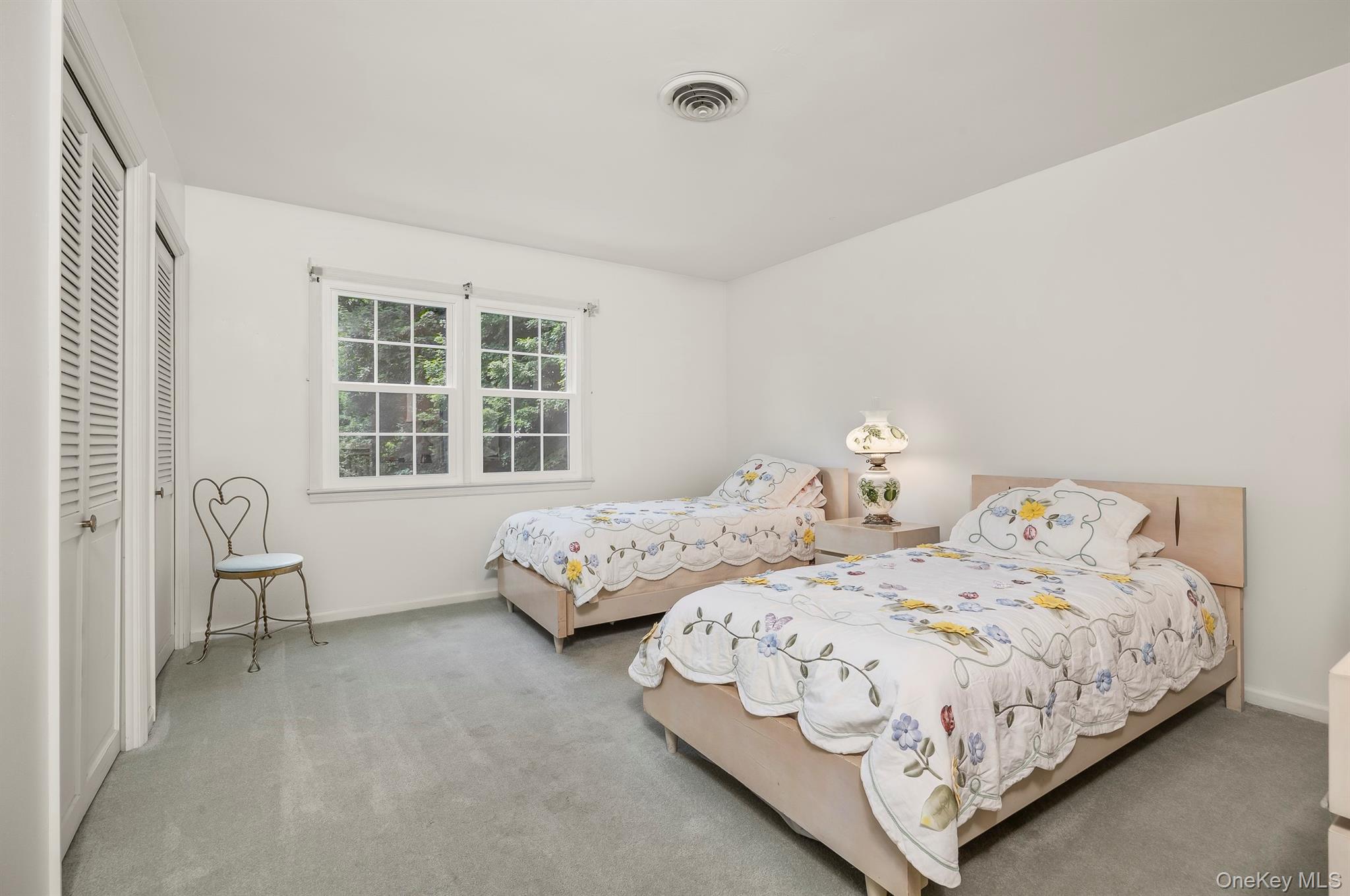 75 Hornbeck Road Poughkeepsie, NY 12603 - Photo 27 of 36 a bedroom with two beds and a window