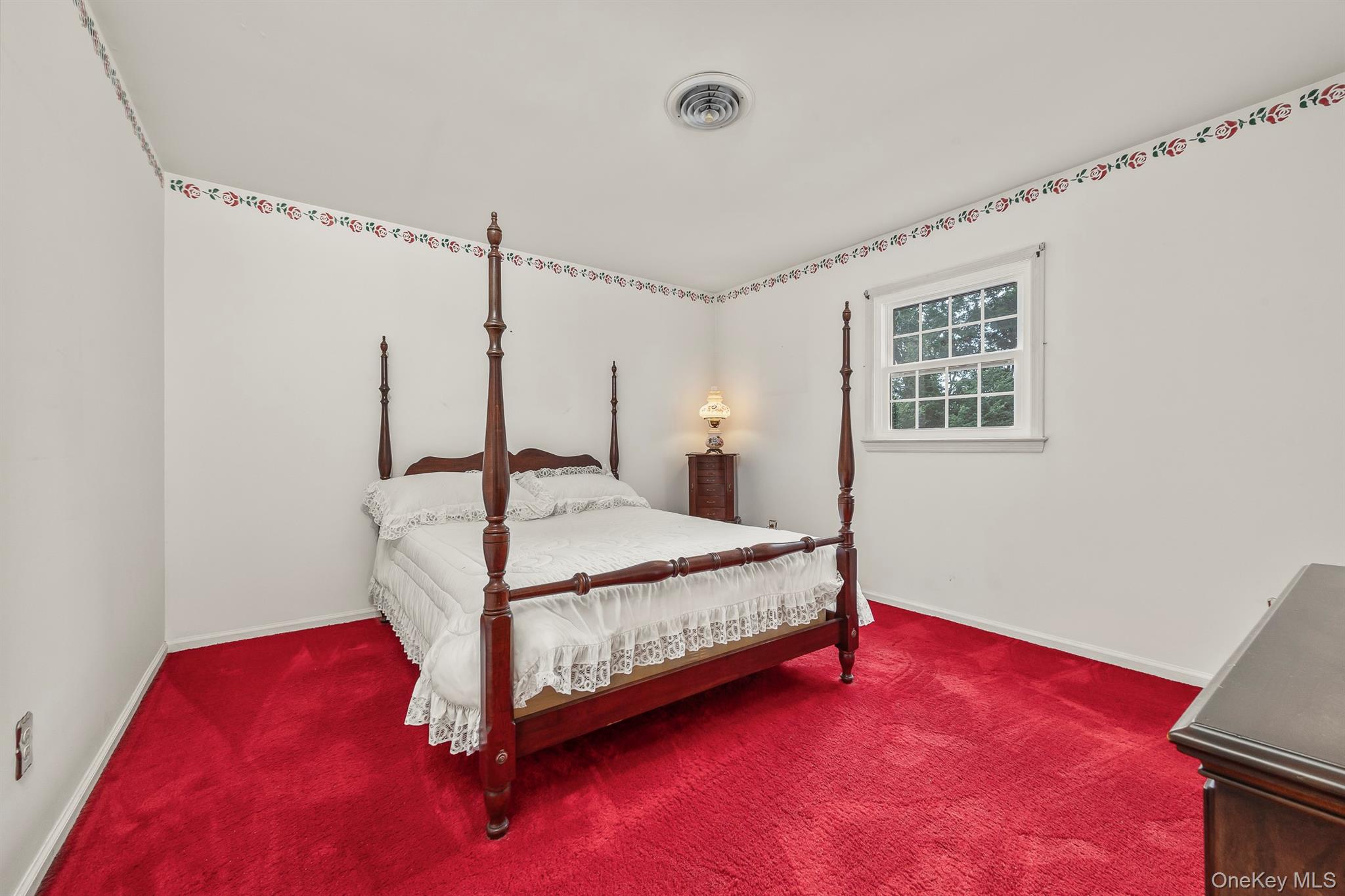 75 Hornbeck Road Poughkeepsie, NY 12603 - Photo 28 of 36 a bedroom with a bed and a window