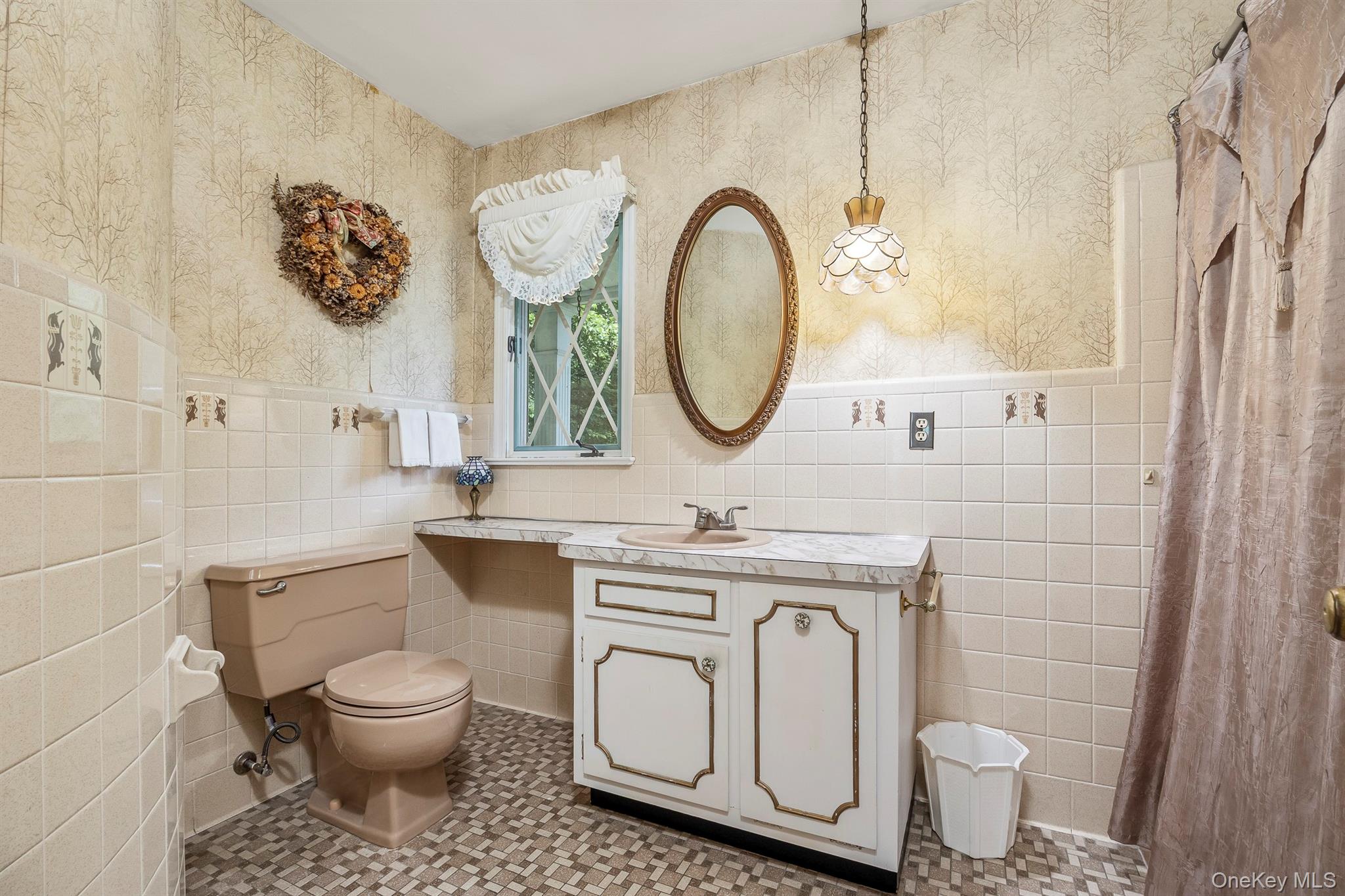 75 Hornbeck Road Poughkeepsie, NY 12603 - Photo 30 of 36 a bathroom with a toilet a sink and a mirror