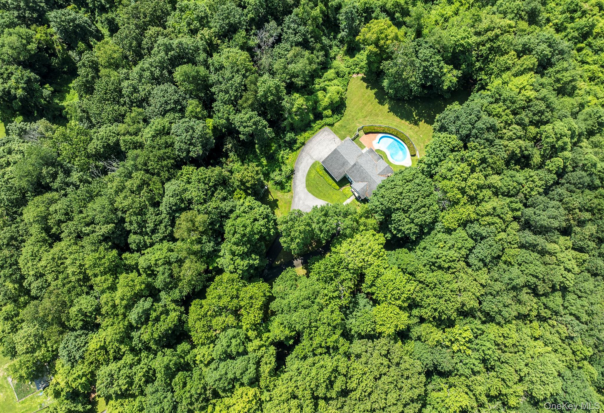 75 Hornbeck Road Poughkeepsie, NY 12603 - Photo 3 of 36 an aerial view of a house with a yard and swimming pool
