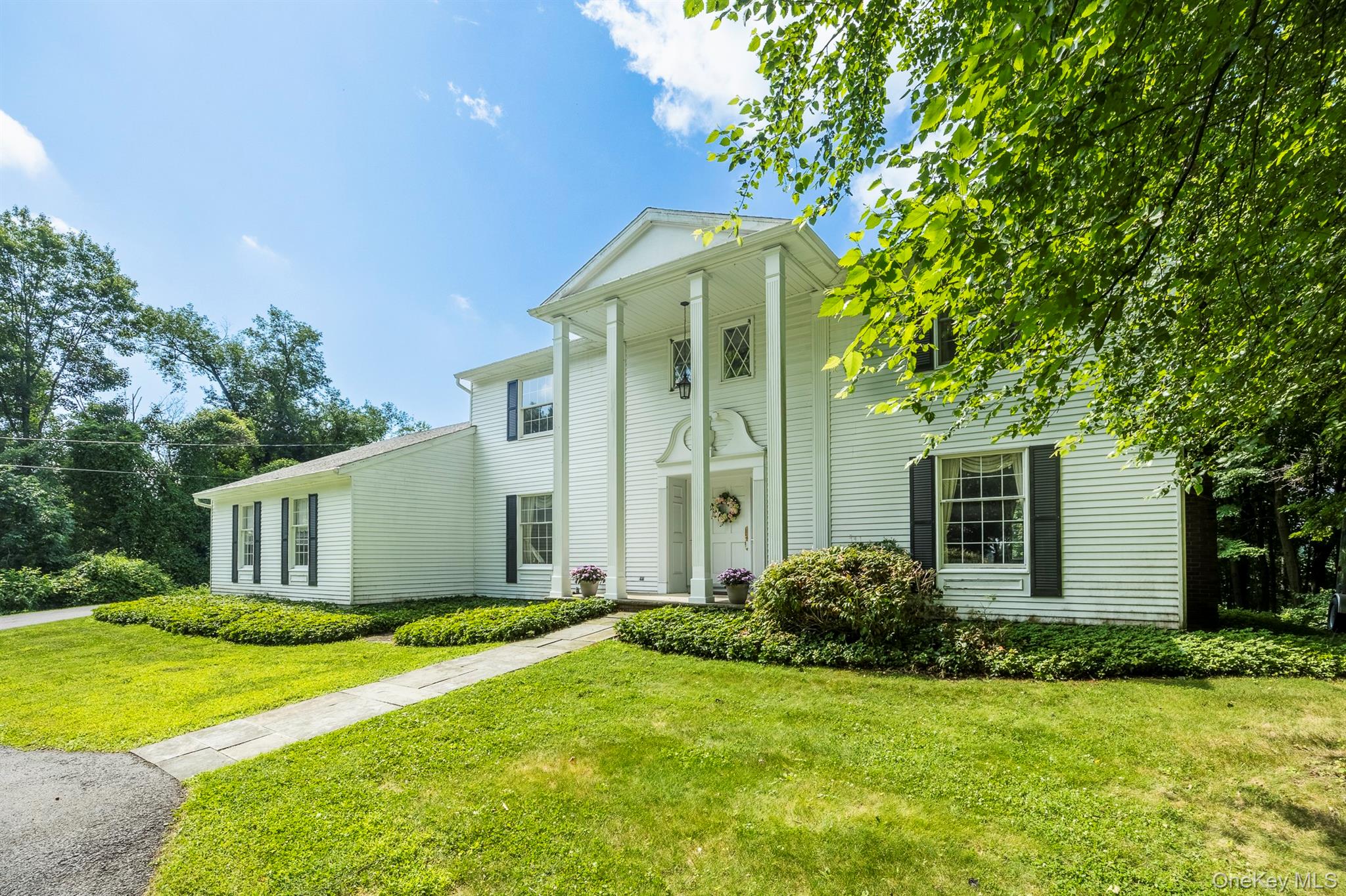 75 Hornbeck Road Poughkeepsie, NY 12603 - Photo 7 of 36 a front view of house with yard and green space