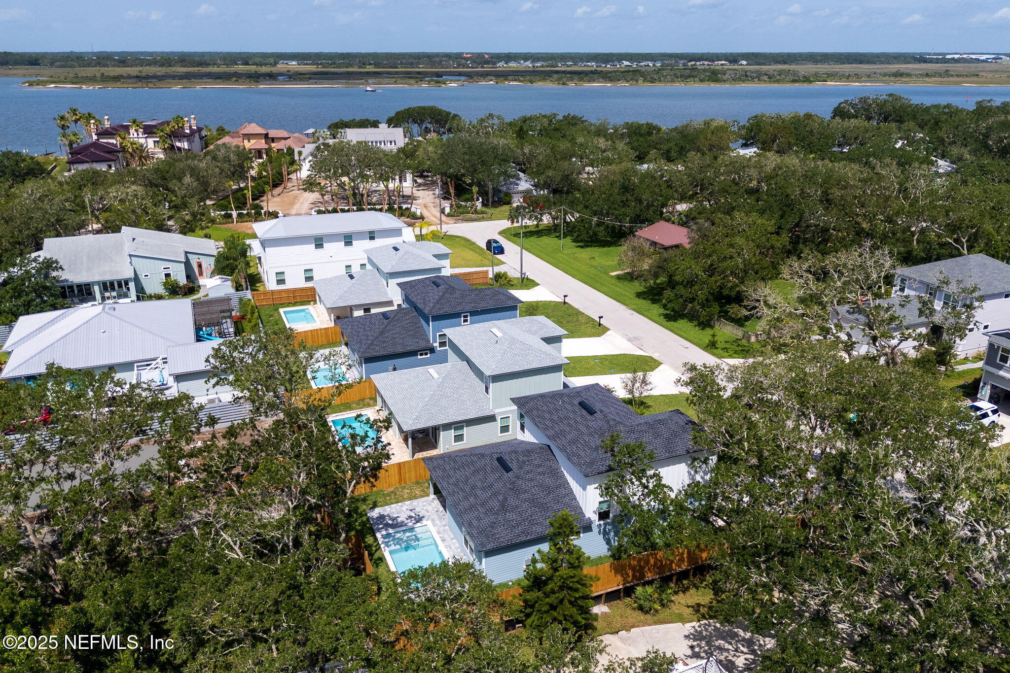 603-609 Twenty Second Street St. Augustine, FL 32084 - Photo 4 of 36 an aerial view of a house with lake view and mountain view