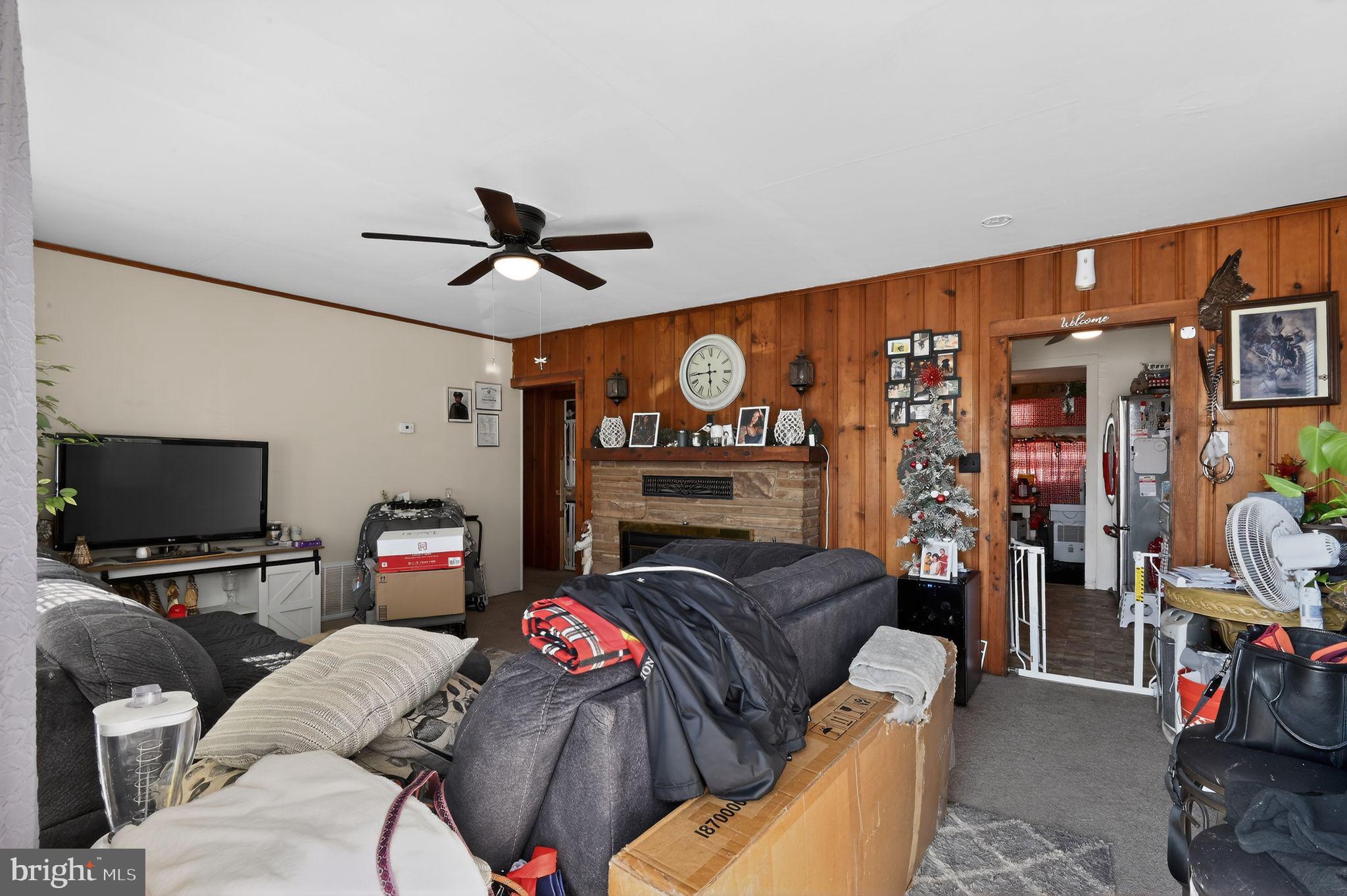 318 Newport Neck Road Newport, NJ 08345 - Photo 14 of 25 a living room with furniture and a flat screen tv