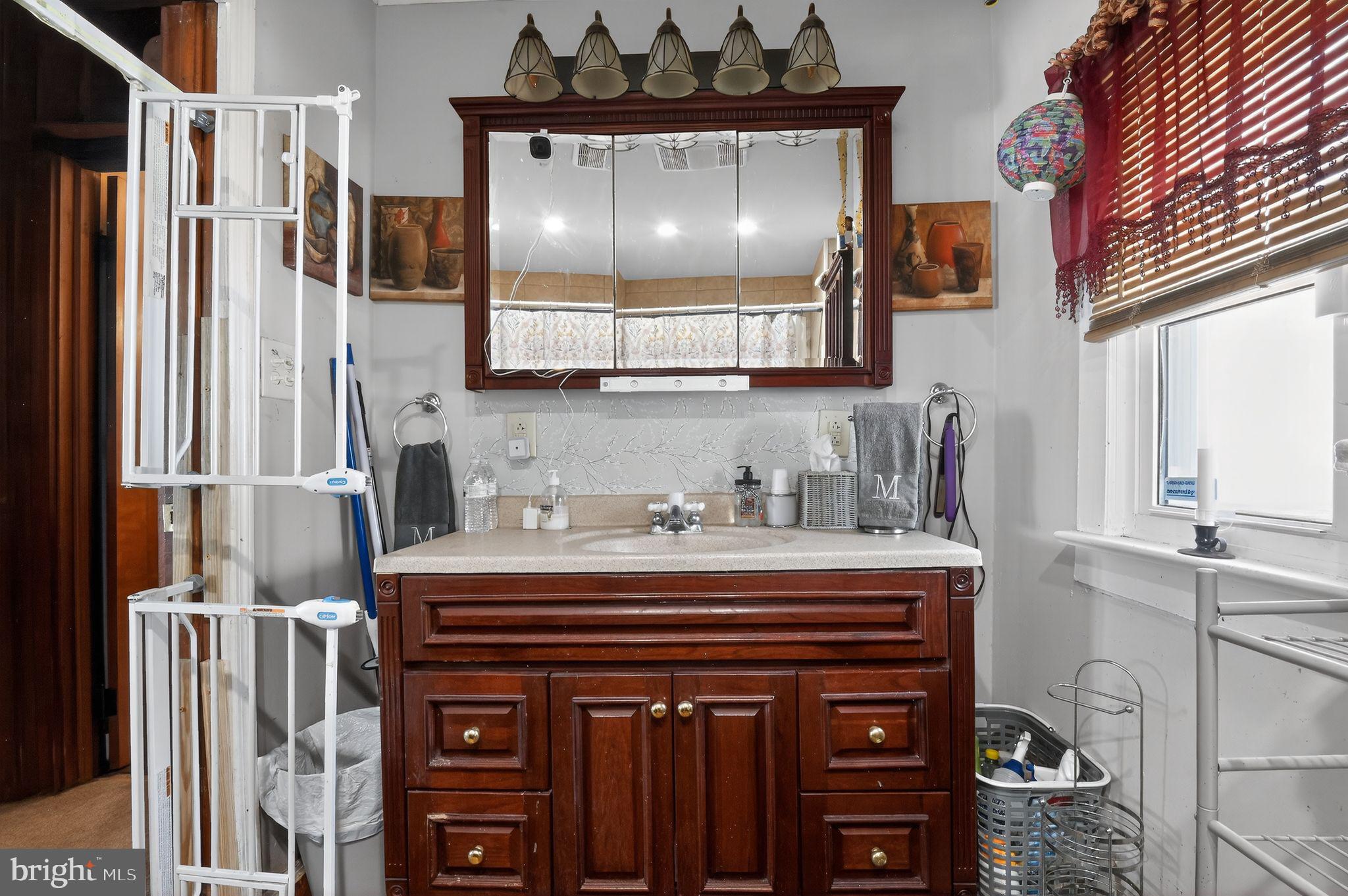318 Newport Neck Road Newport, NJ 08345 - Photo 21 of 25 a view of a kitchen with stainless steel appliances and cabinets