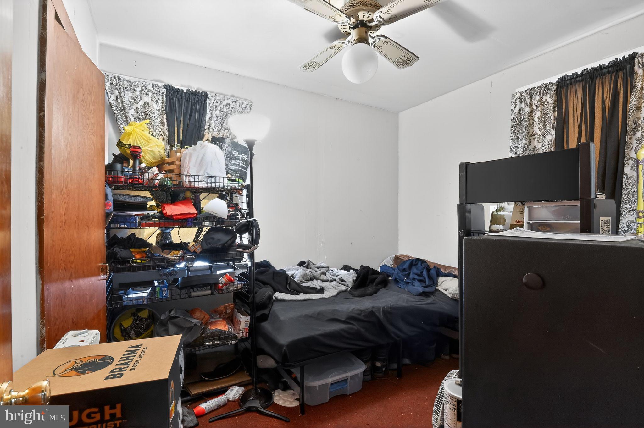318 Newport Neck Road Newport, NJ 08345 - Photo 25 of 25 a living room with furniture and a flat screen tv