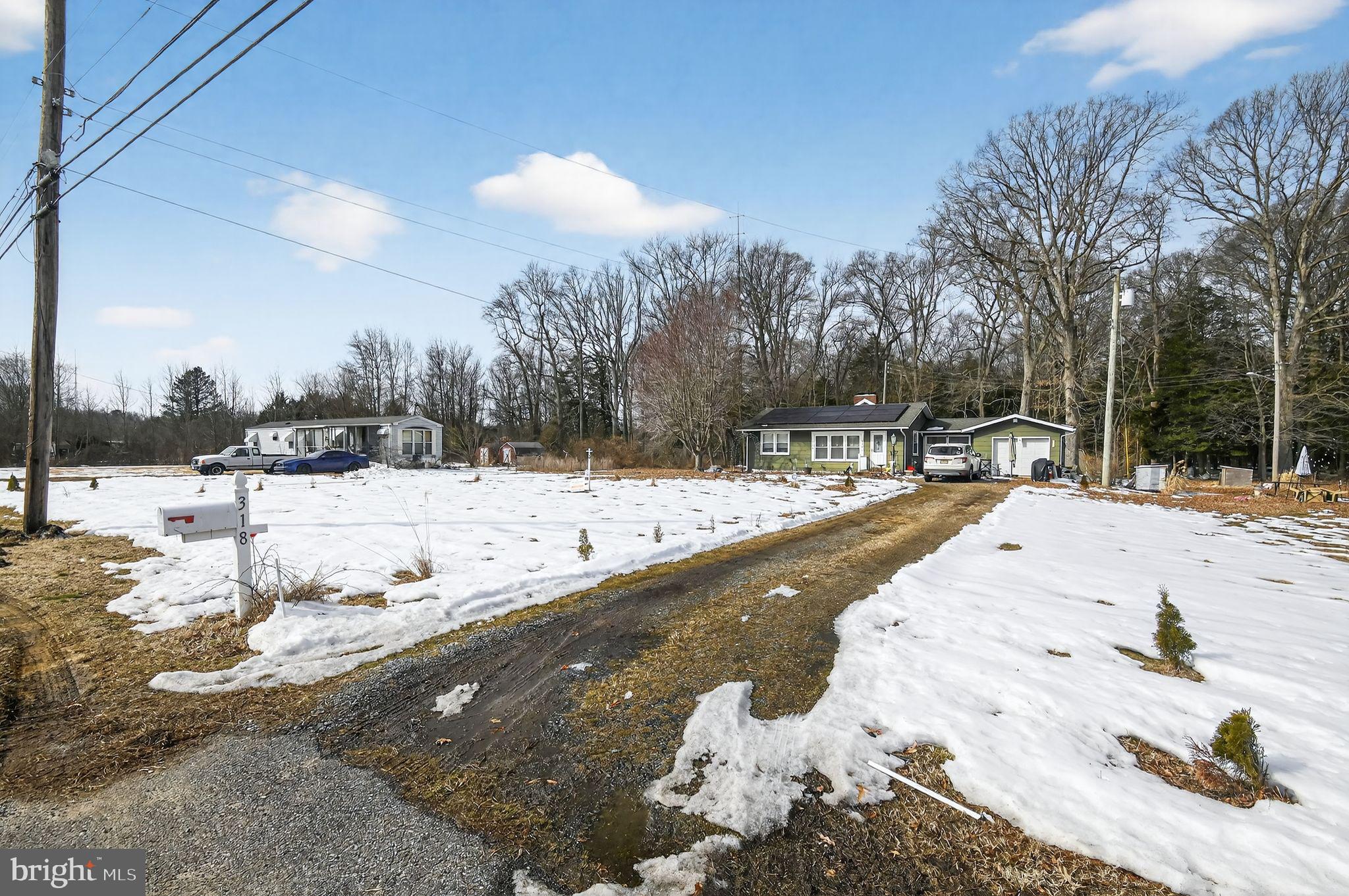 318 Newport Neck Road Newport, NJ 08345 - Photo 3 of 25 a view of snow on the side of a road