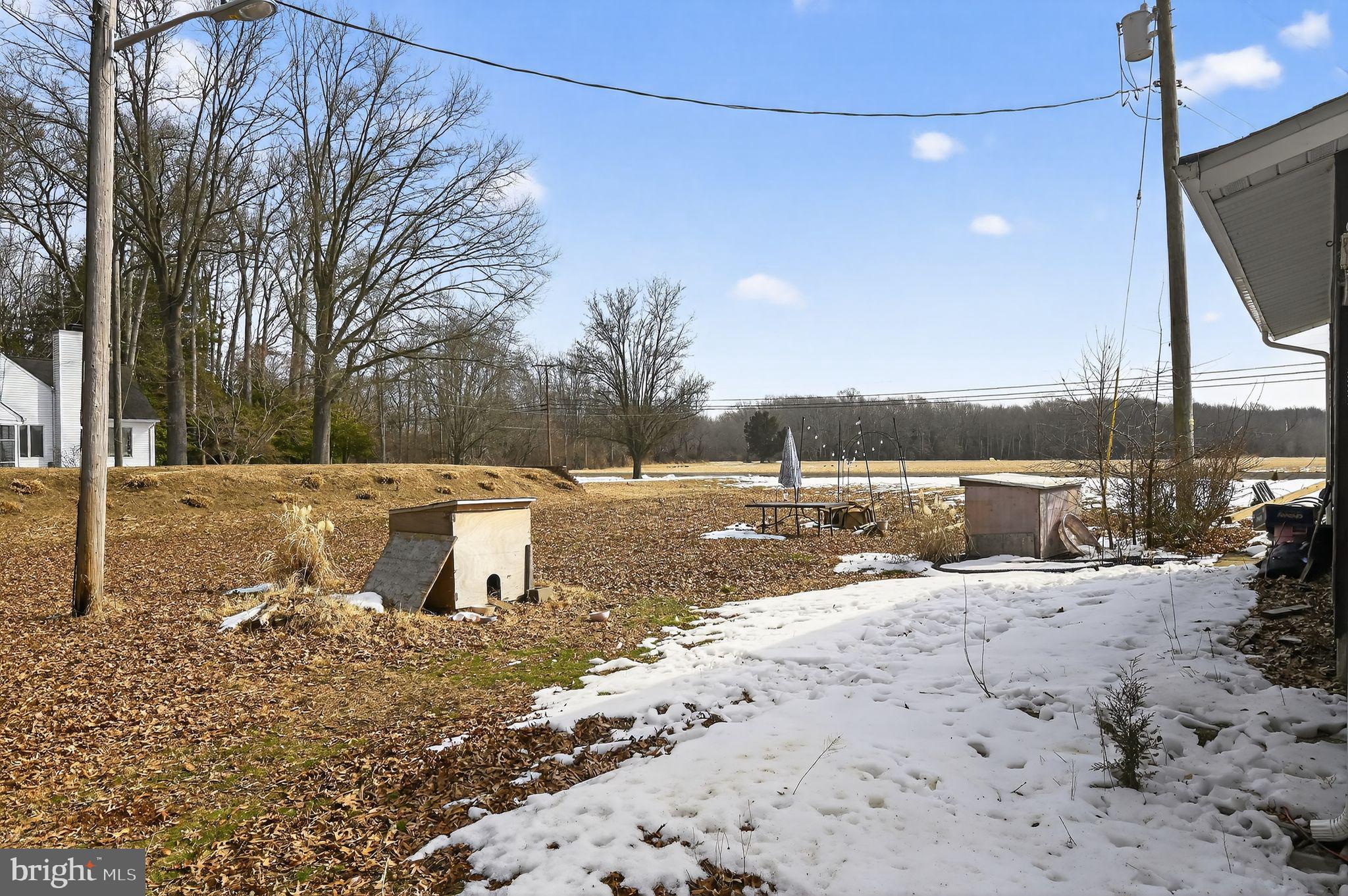 318 Newport Neck Road Newport, NJ 08345 - Photo 10 of 25 a view of a yard with wooden fence