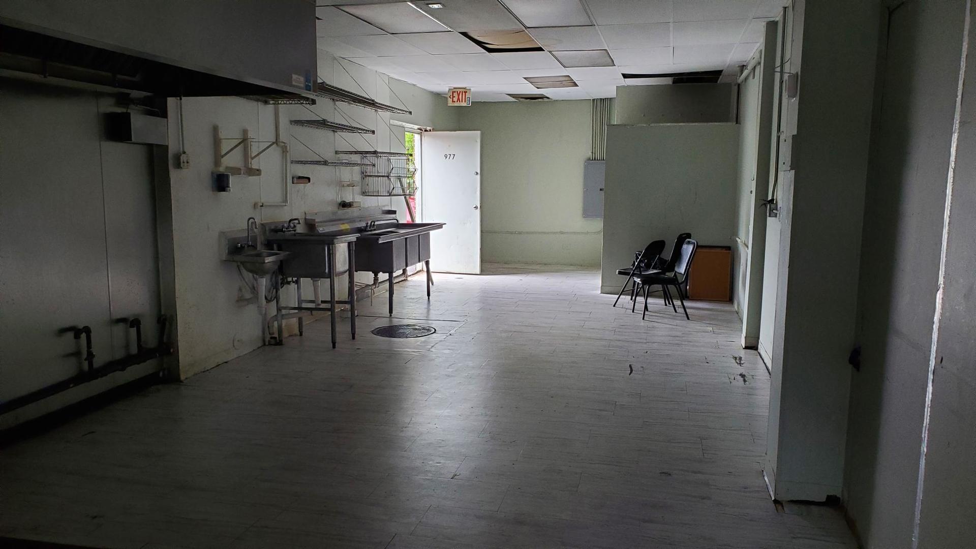 979 West Wise Road Schaumburg, IL 60193 - Photo 15 of 15 an empty room with wooden floor and windows