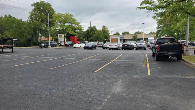 a view of street with parked cars