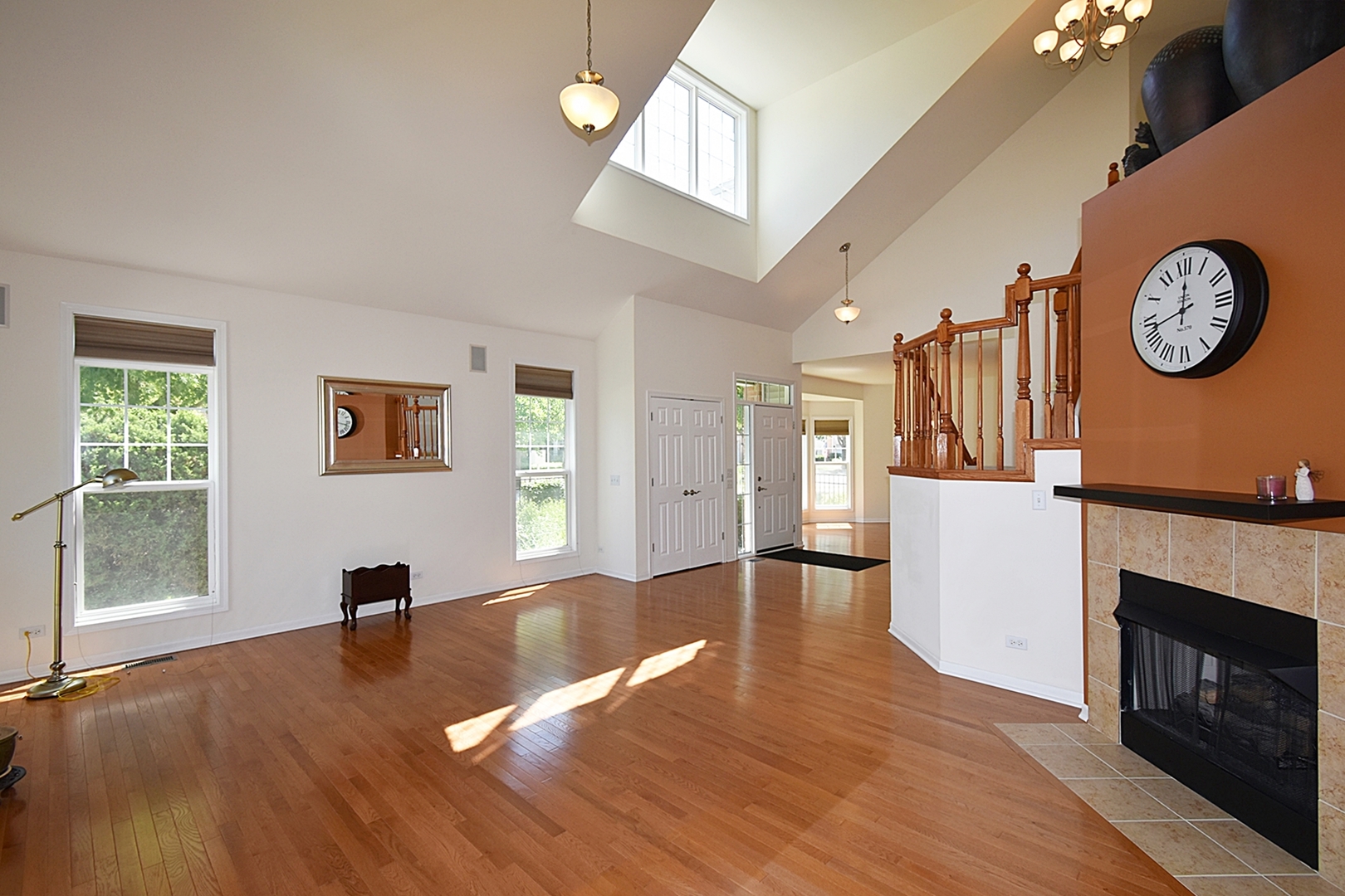 160 Orchards Pass Bartlett, IL 60103 - Photo 11 of 46 a view of livingroom with kitchen and hardwood floor