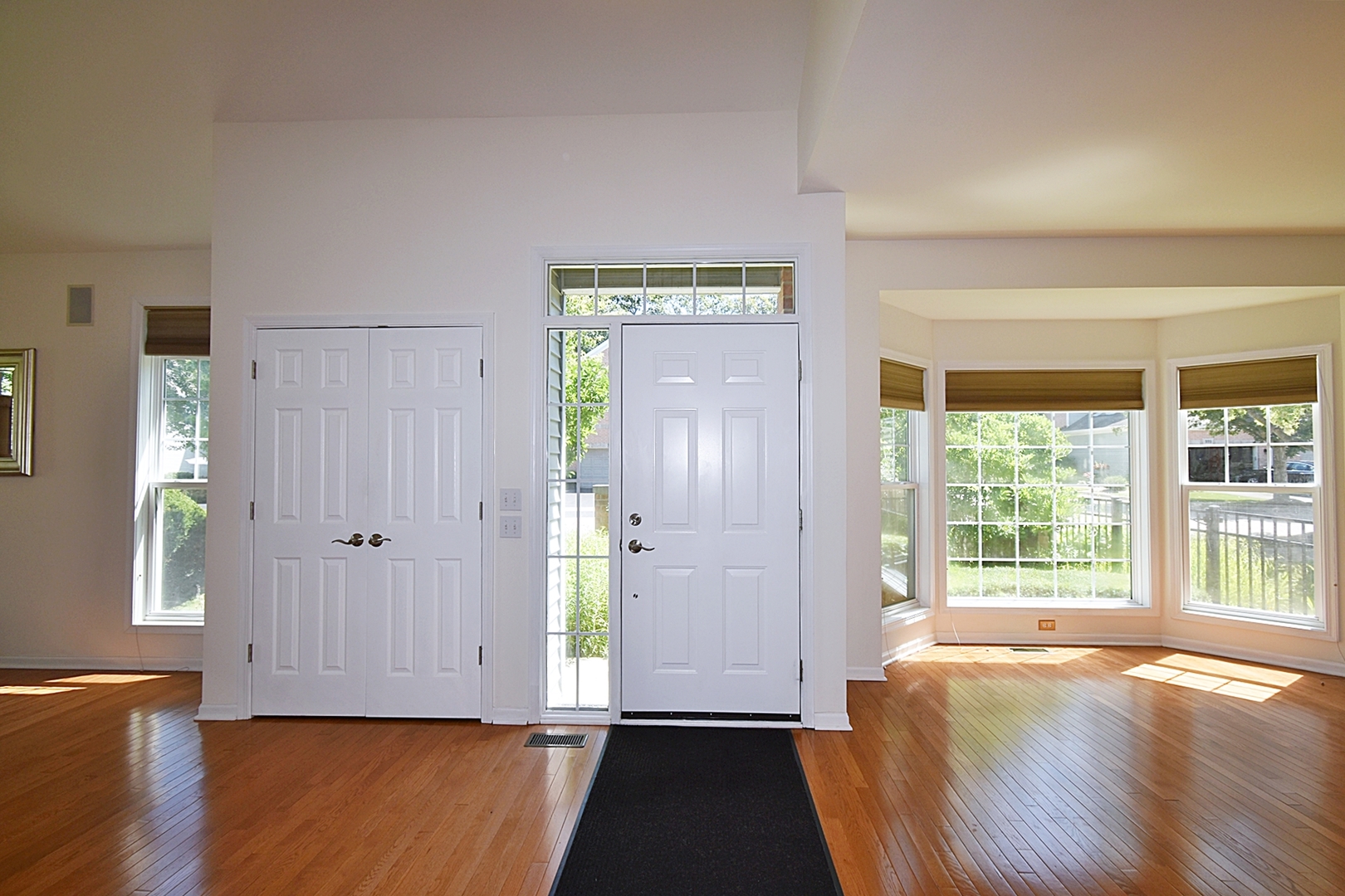 160 Orchards Pass Bartlett, IL 60103 - Photo 14 of 46 a view of a room with wooden floor and windows