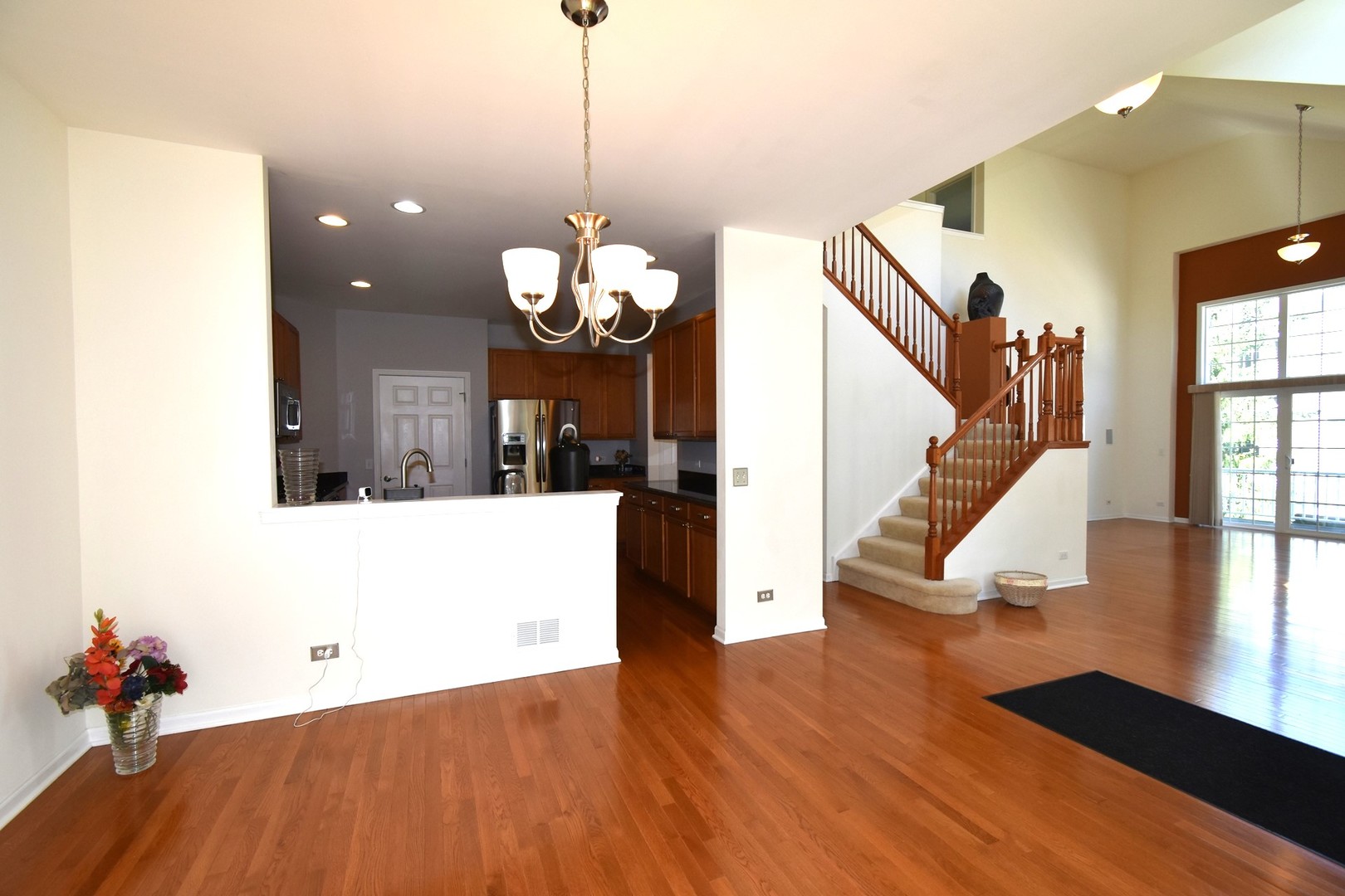 160 Orchards Pass Bartlett, IL 60103 - Photo 15 of 46 a view of a living room and wooden floor