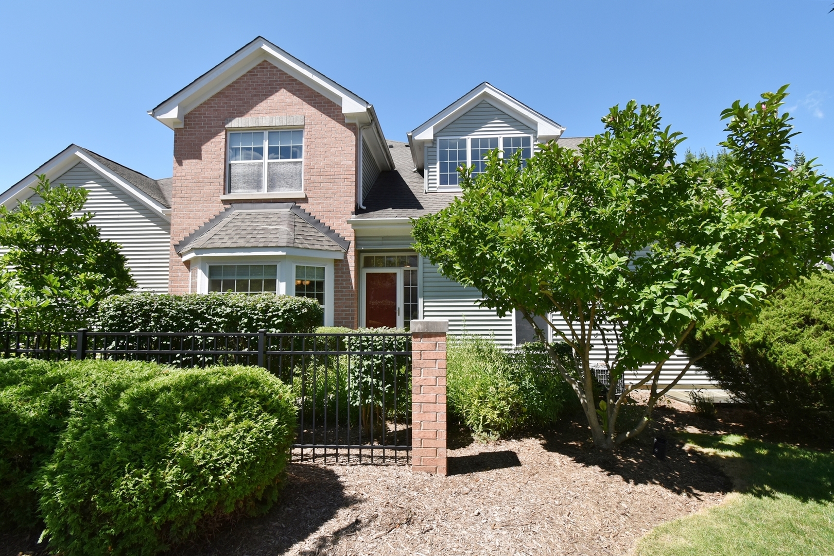160 Orchards Pass Bartlett, IL 60103 - Photo 4 of 46 a front view of a house with a yard