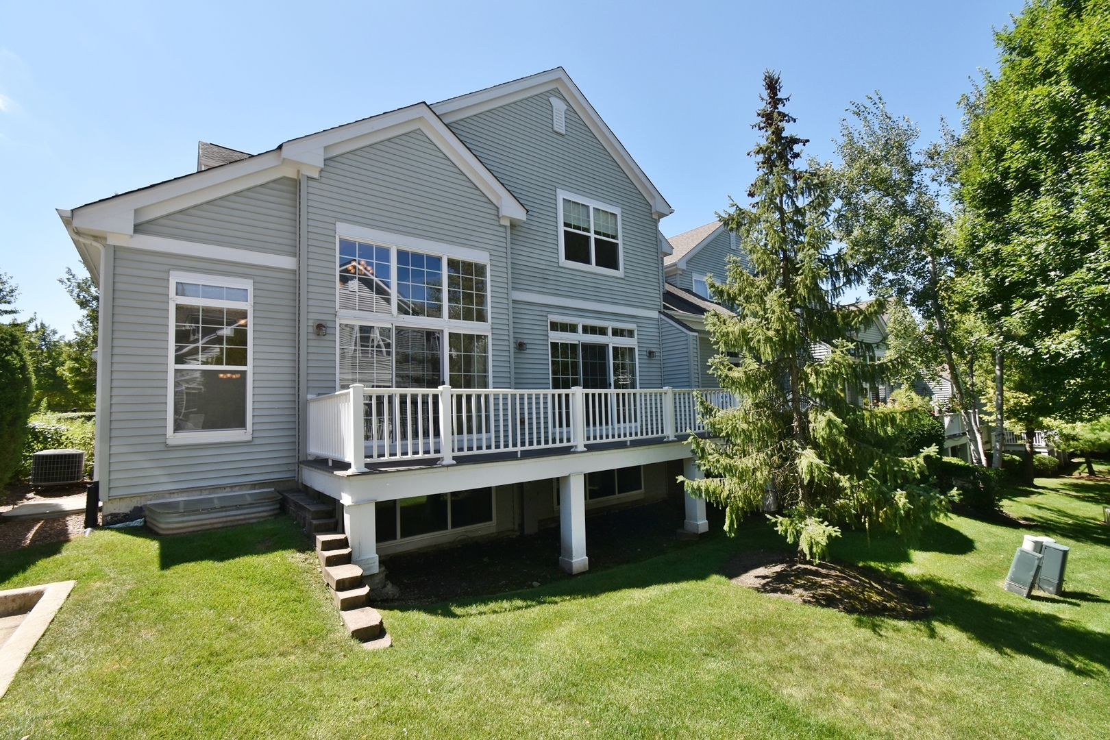 160 Orchards Pass Bartlett, IL 60103 - Photo 45 of 46 front view of a house with a yard
