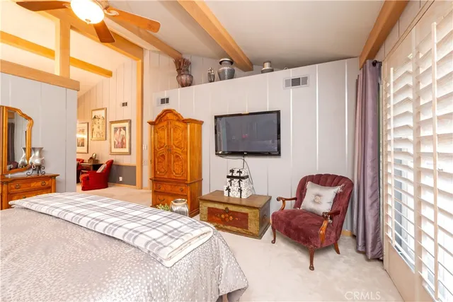 a bathroom with a sink a toilet and a shower