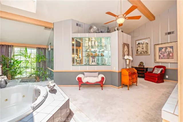 a front view of a house with a garden and porch