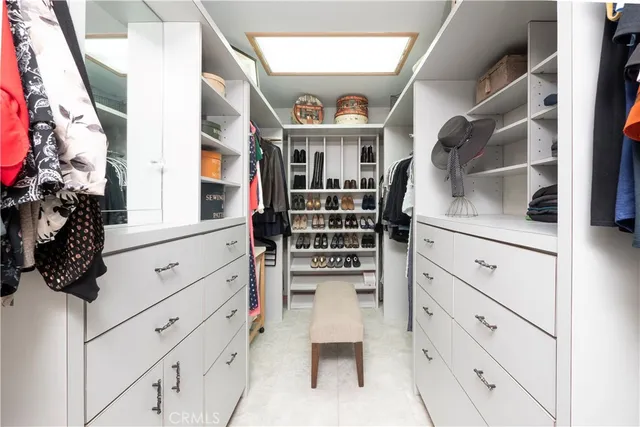 a view of a patio with a dining table and chairs
