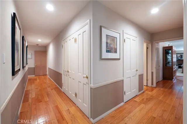 a view of a patio with a table chairs and a backyard