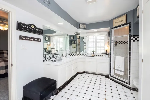 a backyard of a house with lots of green space and fountain