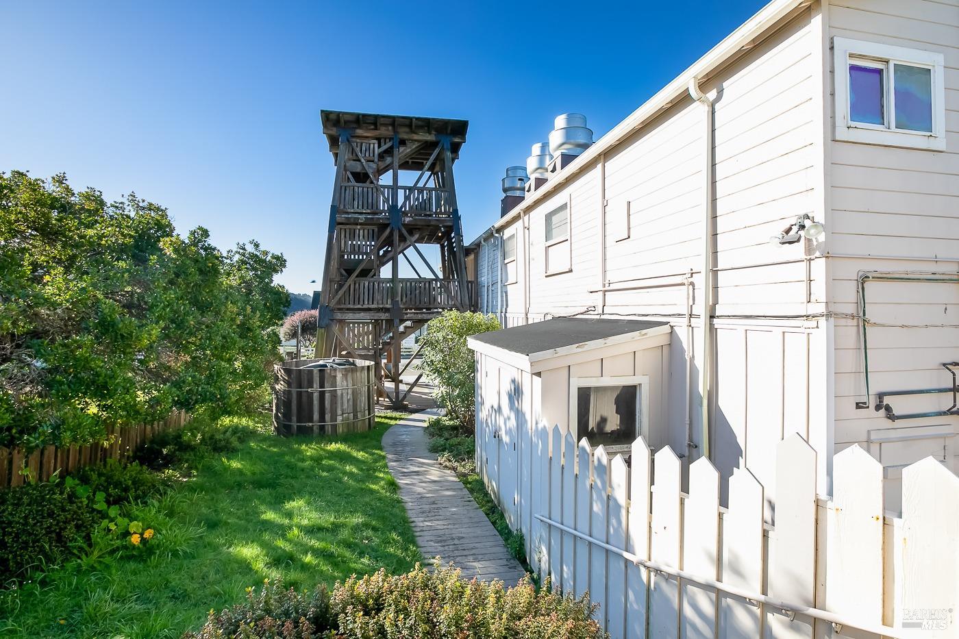 45040 Main Street Mendocino, CA 95460 - Photo 11 of 28 a front view of a house with a yard