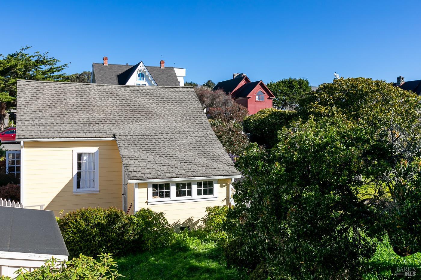 45040 Main Street Mendocino, CA 95460 - Photo 12 of 28 a front view of a house with a yard