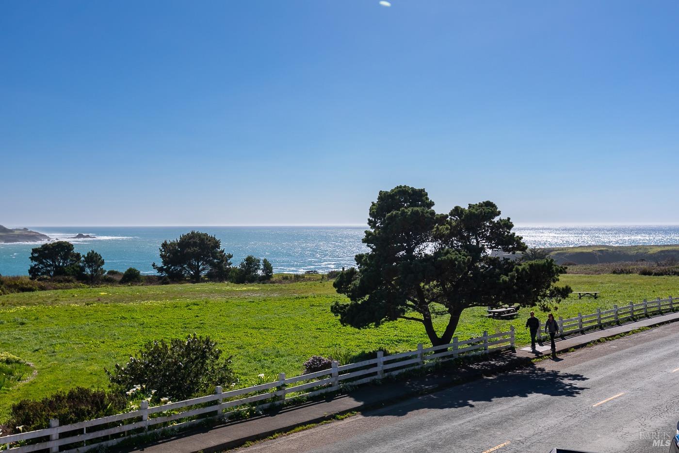 45040 Main Street Mendocino, CA 95460 - Photo 24 of 28 a view of a street with a yard