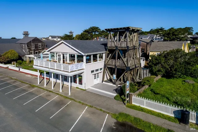 aerial view of a house with a garden