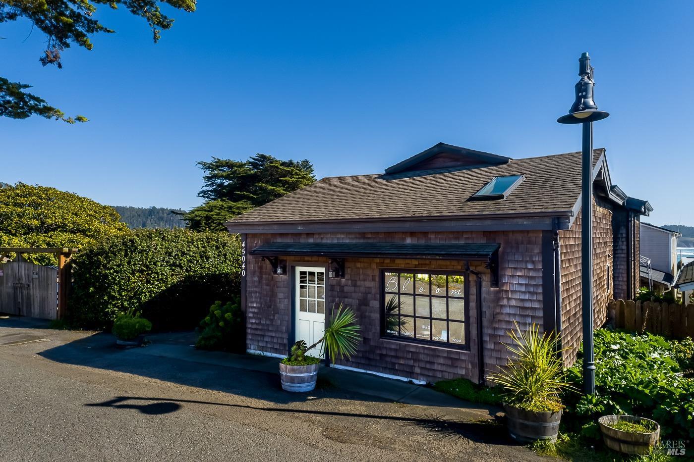 45040 Main Street Mendocino, CA 95460 - Photo 28 of 28 a front view of a house with garden