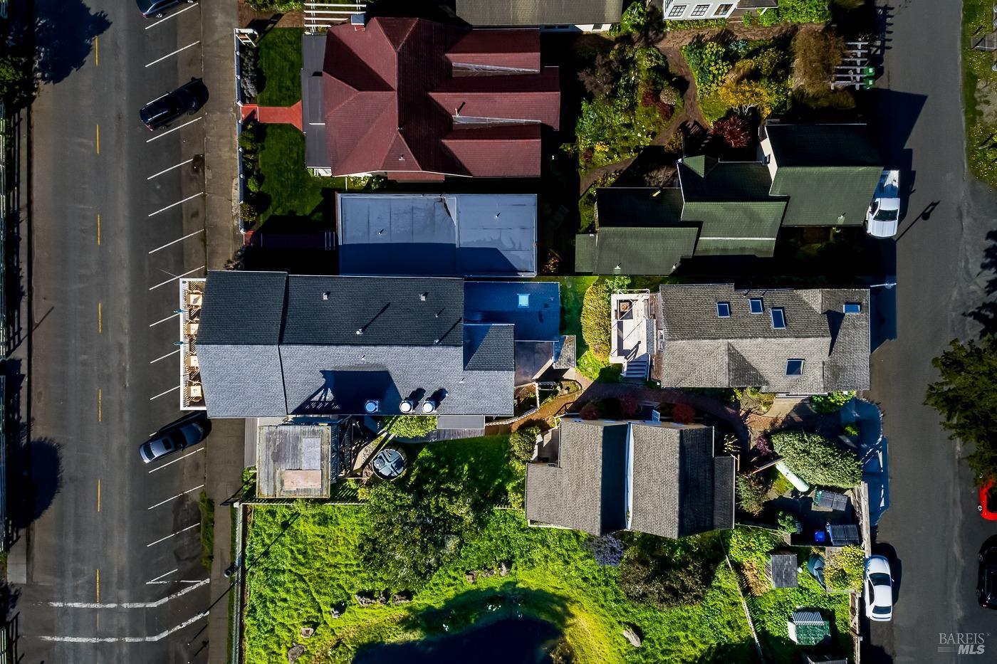45040 Main Street Mendocino, CA 95460 - Photo 9 of 28 an aerial view of multiple houses with outdoor space