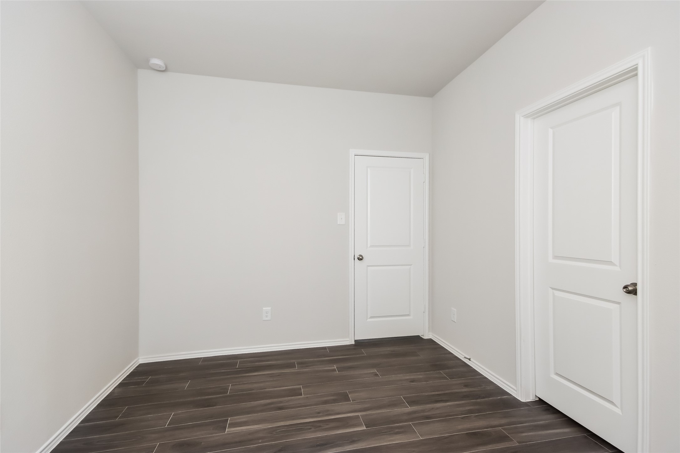 15264 Estrella Road East Houston, TX 77073 - Photo 14 of 14 a view of an empty room with wooden floor