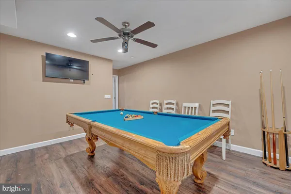 a room with furniture and wooden floor