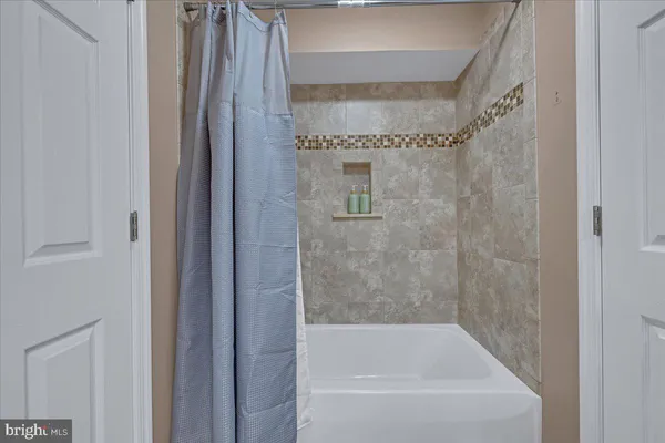 a bathroom with a bathtub