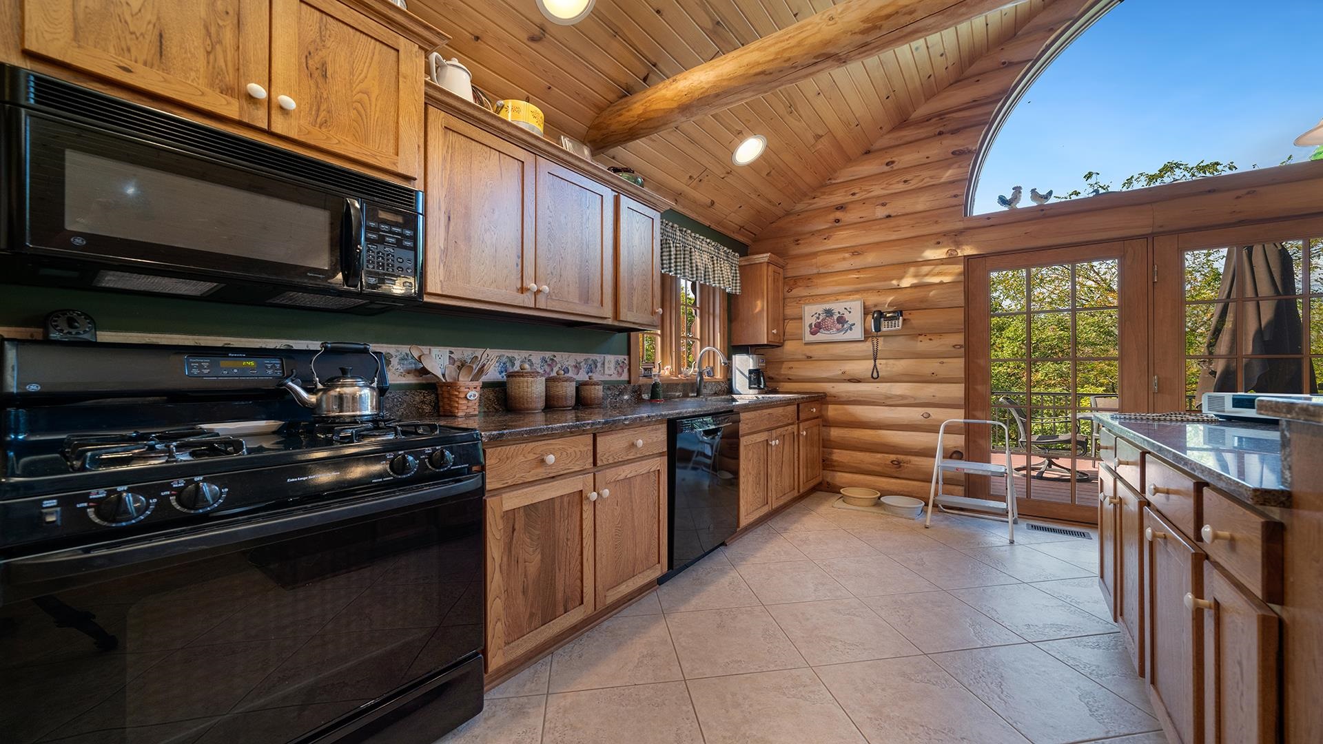 5810 West Lightsville Road Leaf River, IL 61047 - Photo 19 of 68 a kitchen with stainless steel appliances and stove top oven