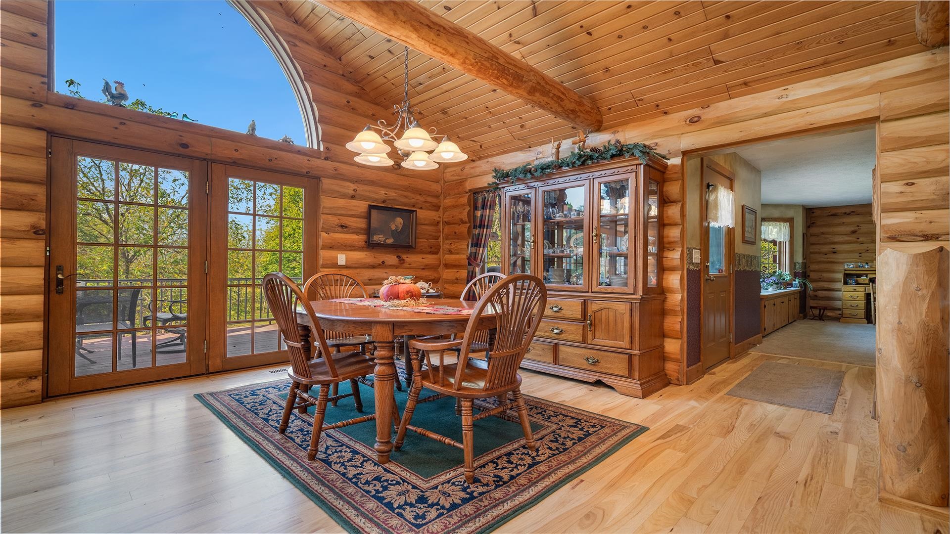 5810 West Lightsville Road Leaf River, IL 61047 - Photo 20 of 68 a view of a dining room with furniture window and wooden floor
