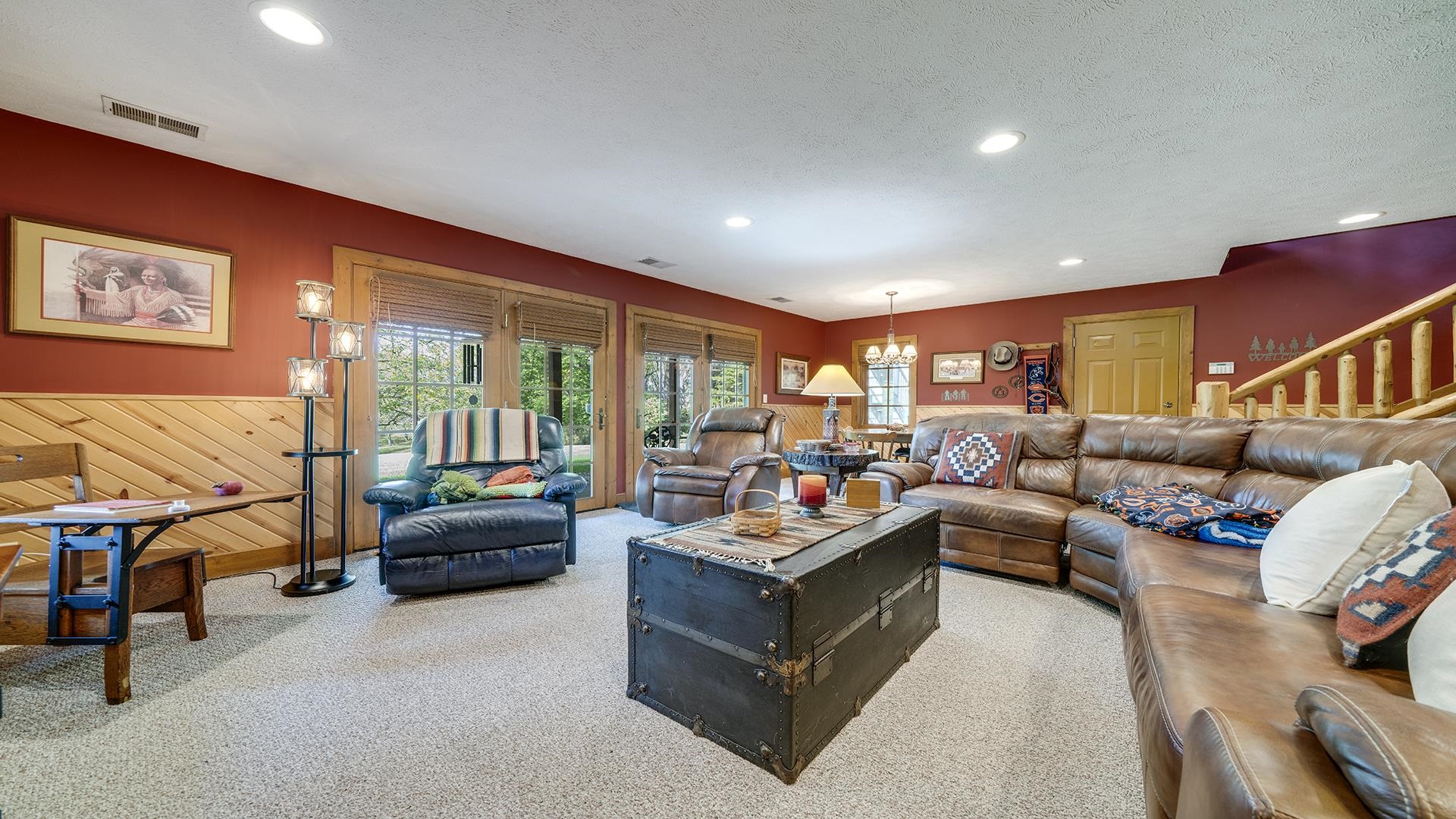 5810 West Lightsville Road Leaf River, IL 61047 - Photo 27 of 68 a living room with furniture and a flat screen tv