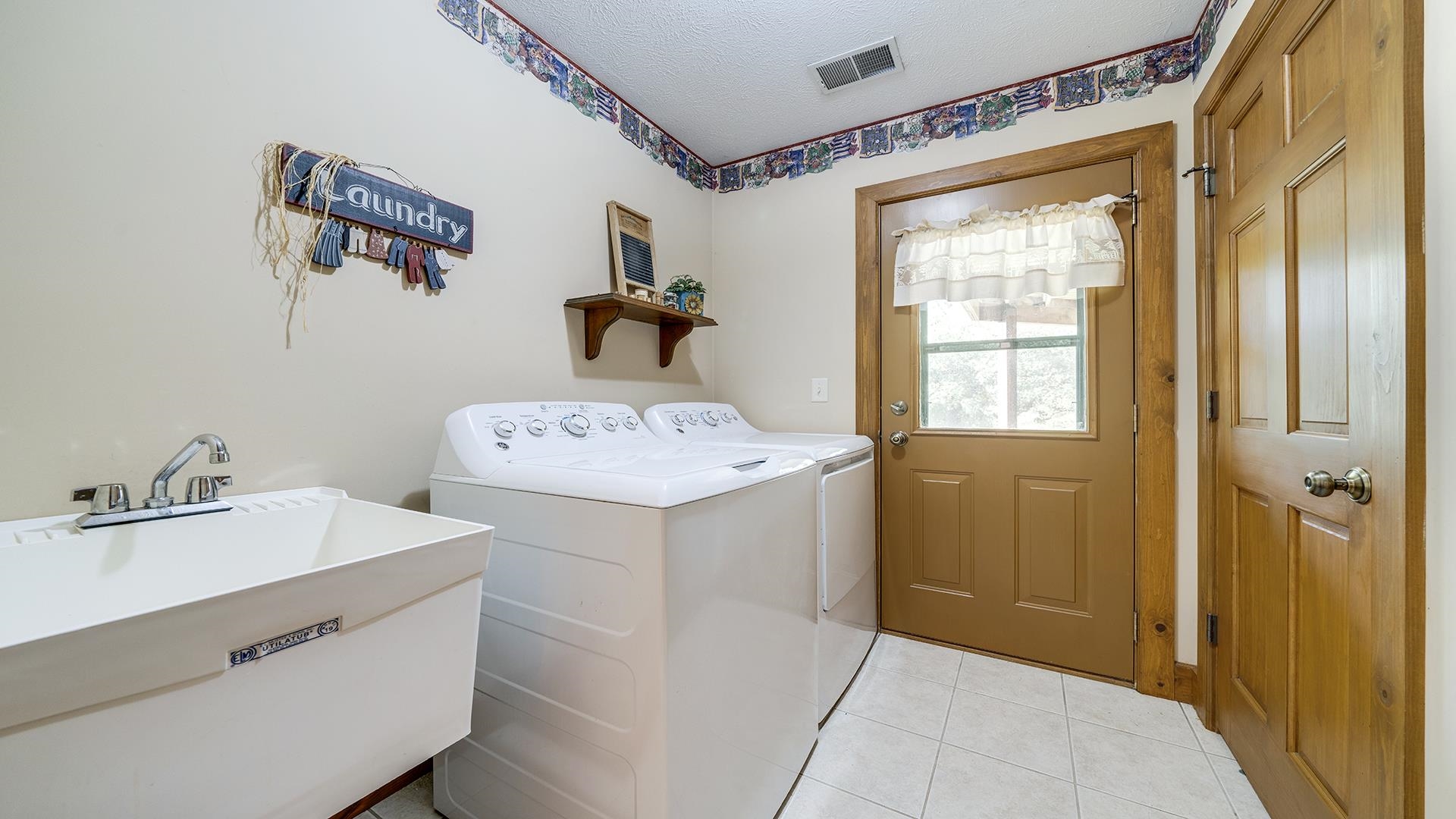 5810 West Lightsville Road Leaf River, IL 61047 - Photo 29 of 68 a bathroom with a sink and a mirror