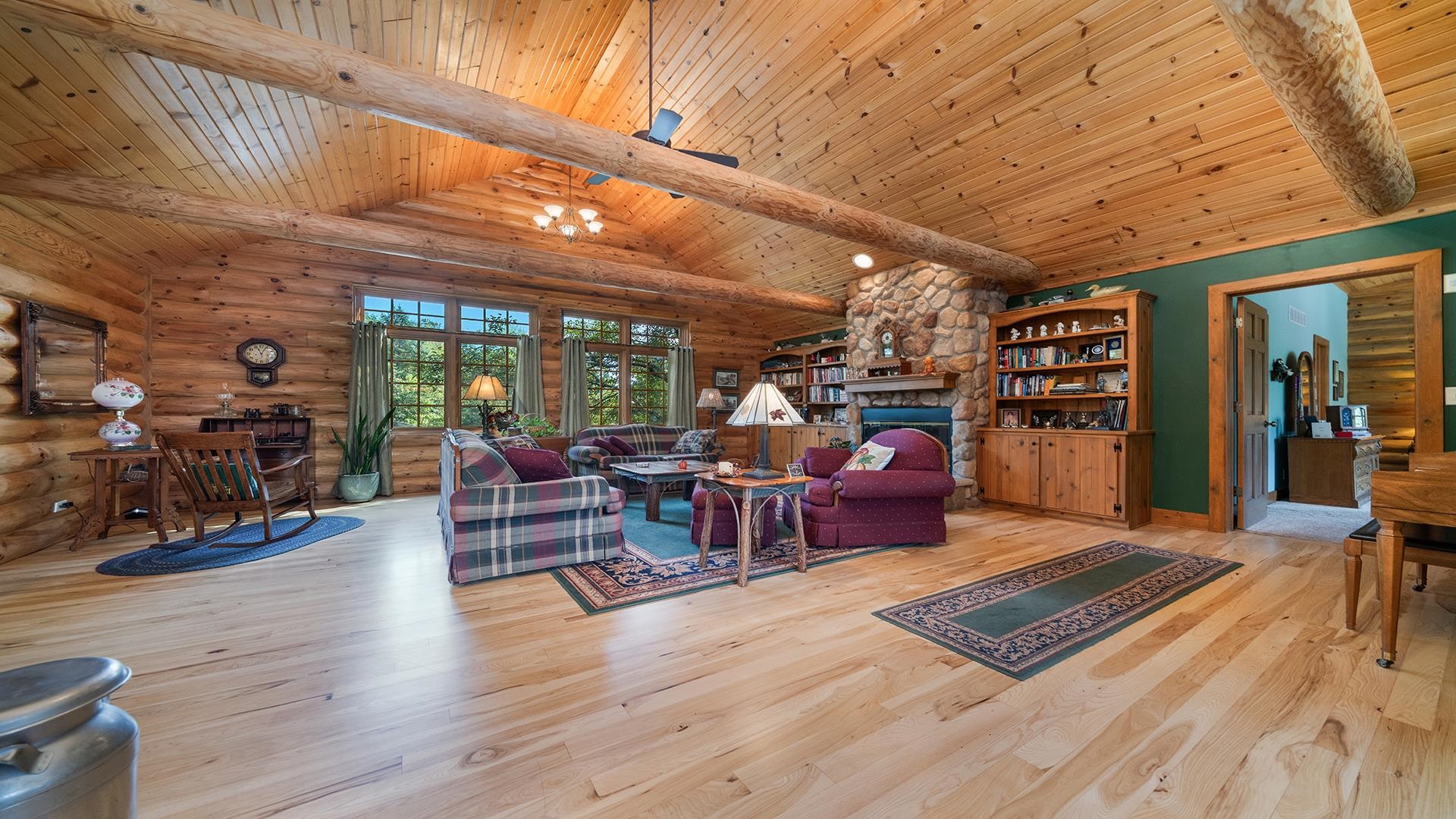 5810 West Lightsville Road Leaf River, IL 61047 - Photo 3 of 68 a living room with lots of furniture wooden floor and next to a window