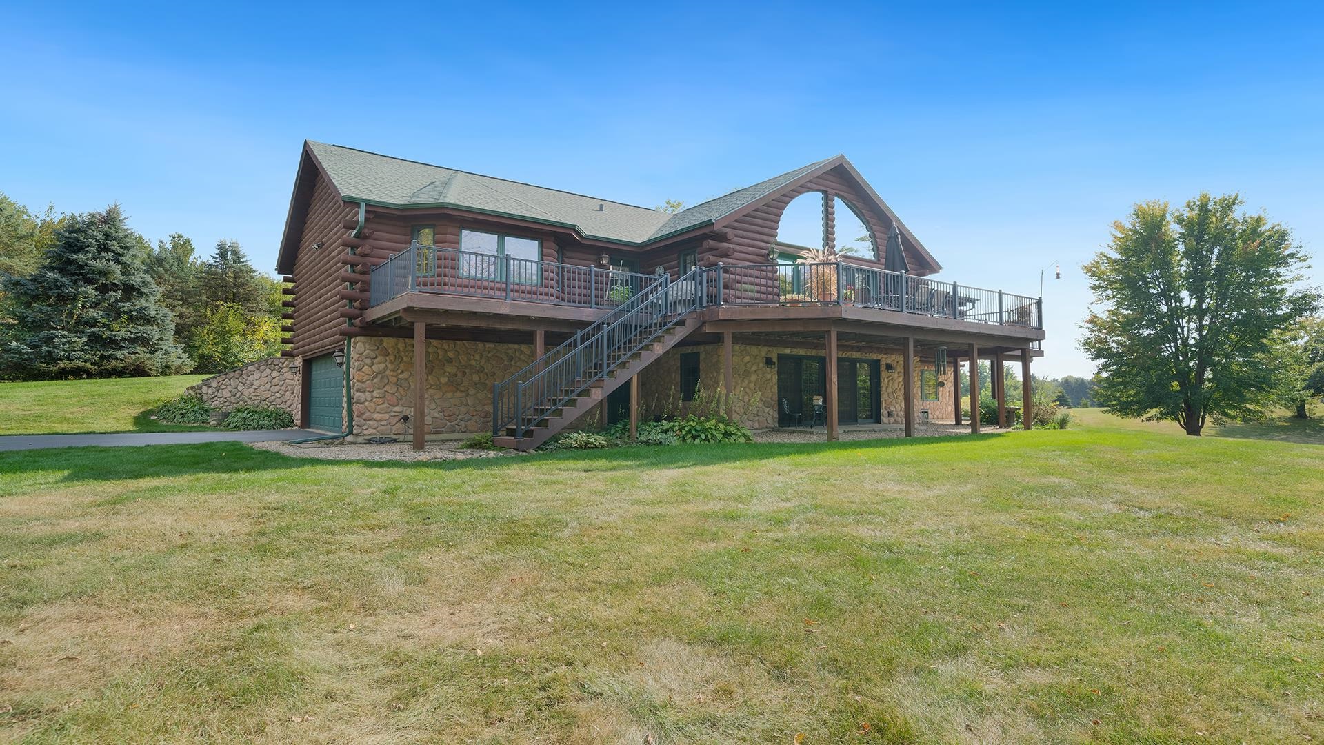 5810 West Lightsville Road Leaf River, IL 61047 - Photo 47 of 68 a front view of a house with a yard