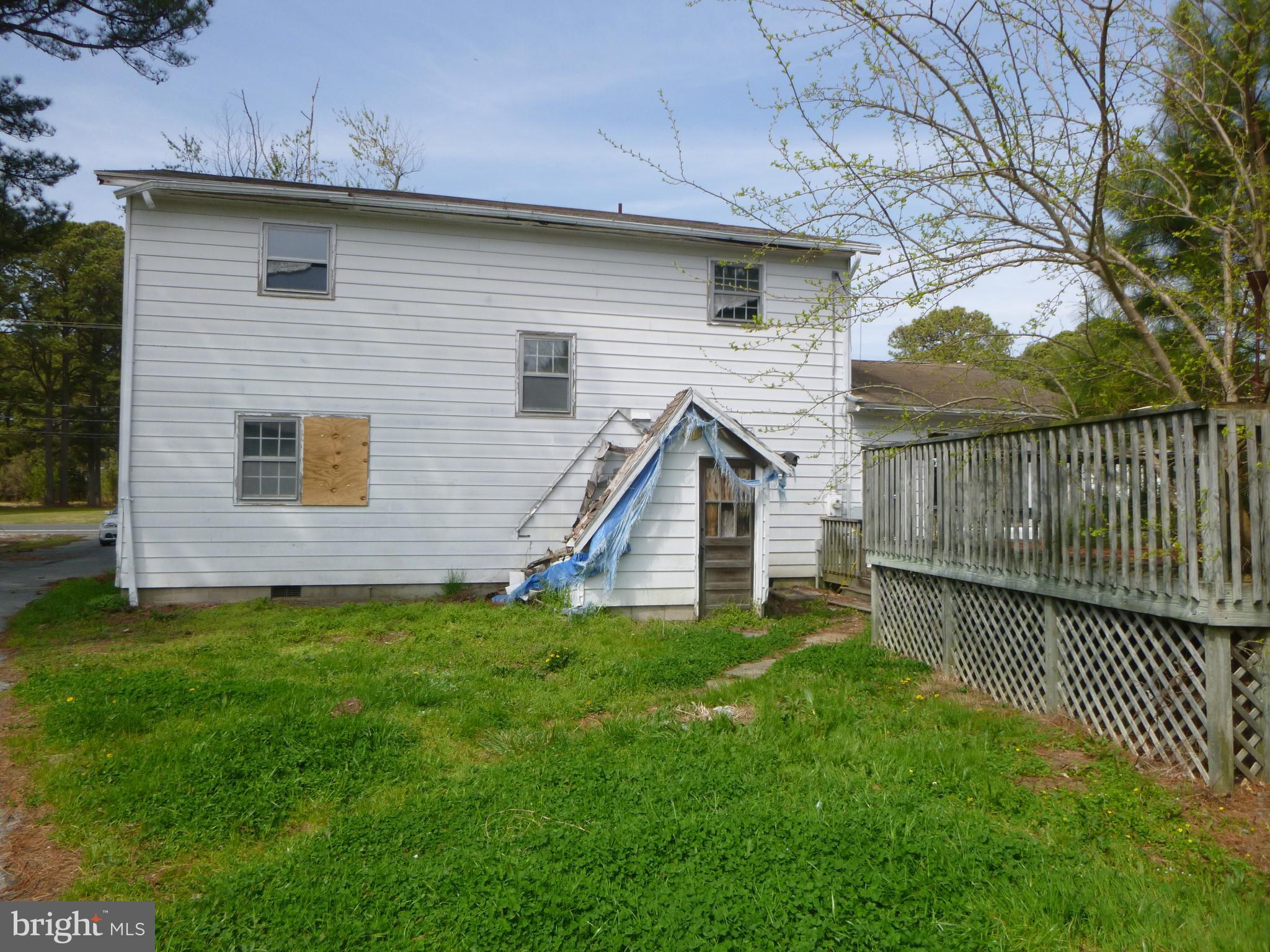 4159 Jacksonville Road Crisfield, MD 21817 - Photo 12 of 12 a view of a house with a yard