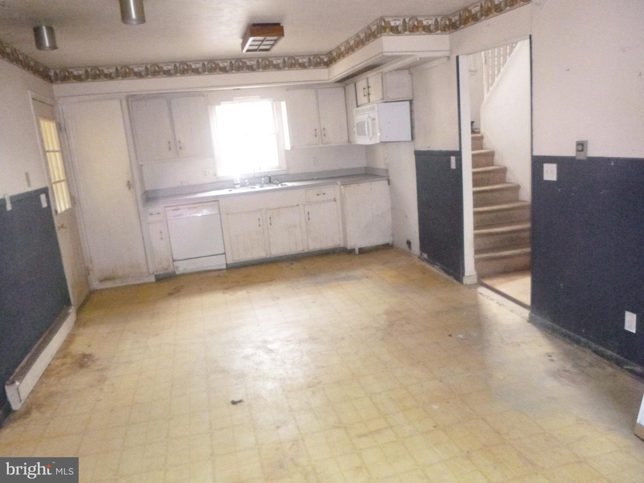 4159 Jacksonville Road Crisfield, MD 21817 - Photo 2 of 12 a view of an empty room with a window
