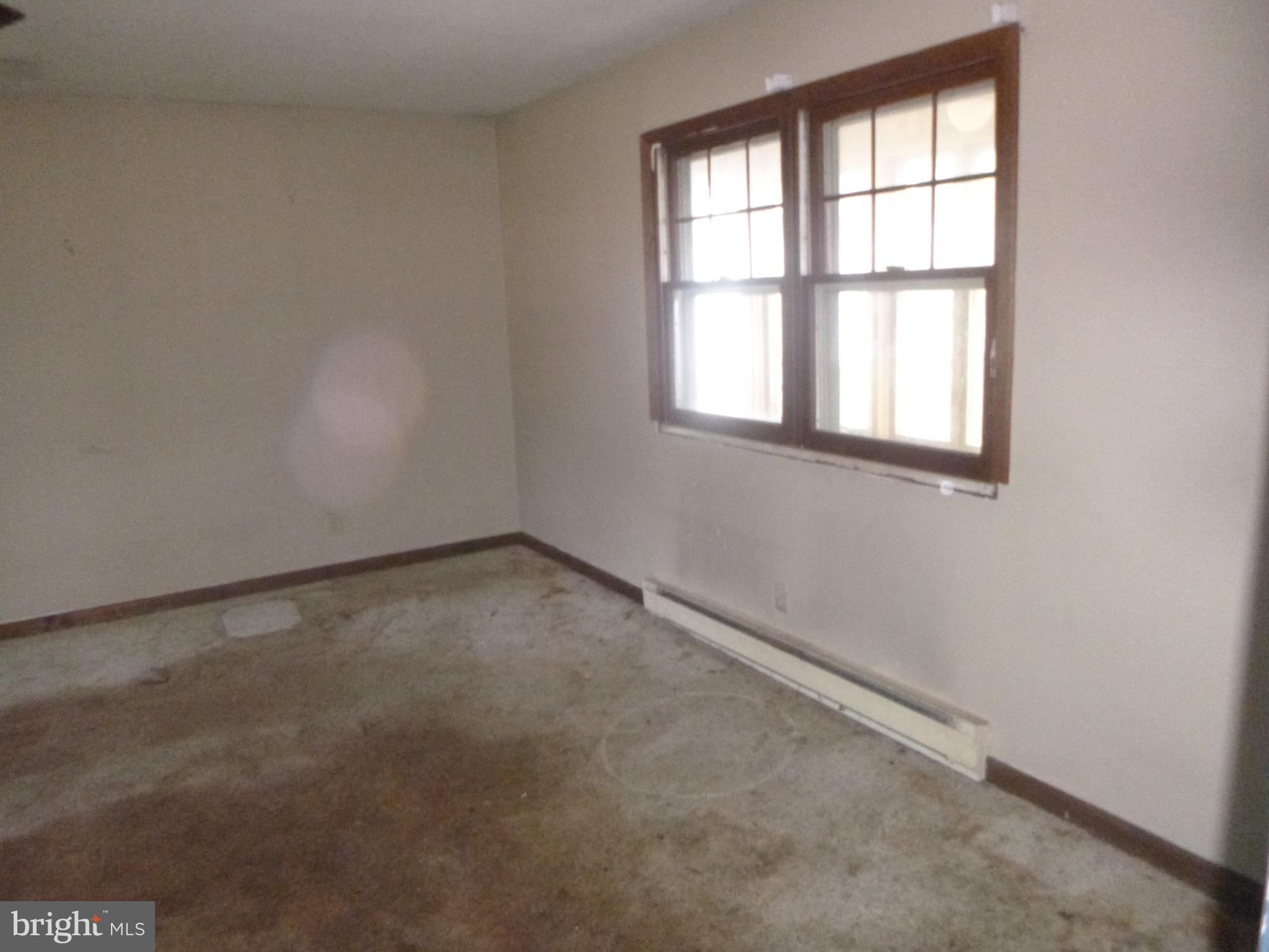 4159 Jacksonville Road Crisfield, MD 21817 - Photo 3 of 12 an empty room with a window