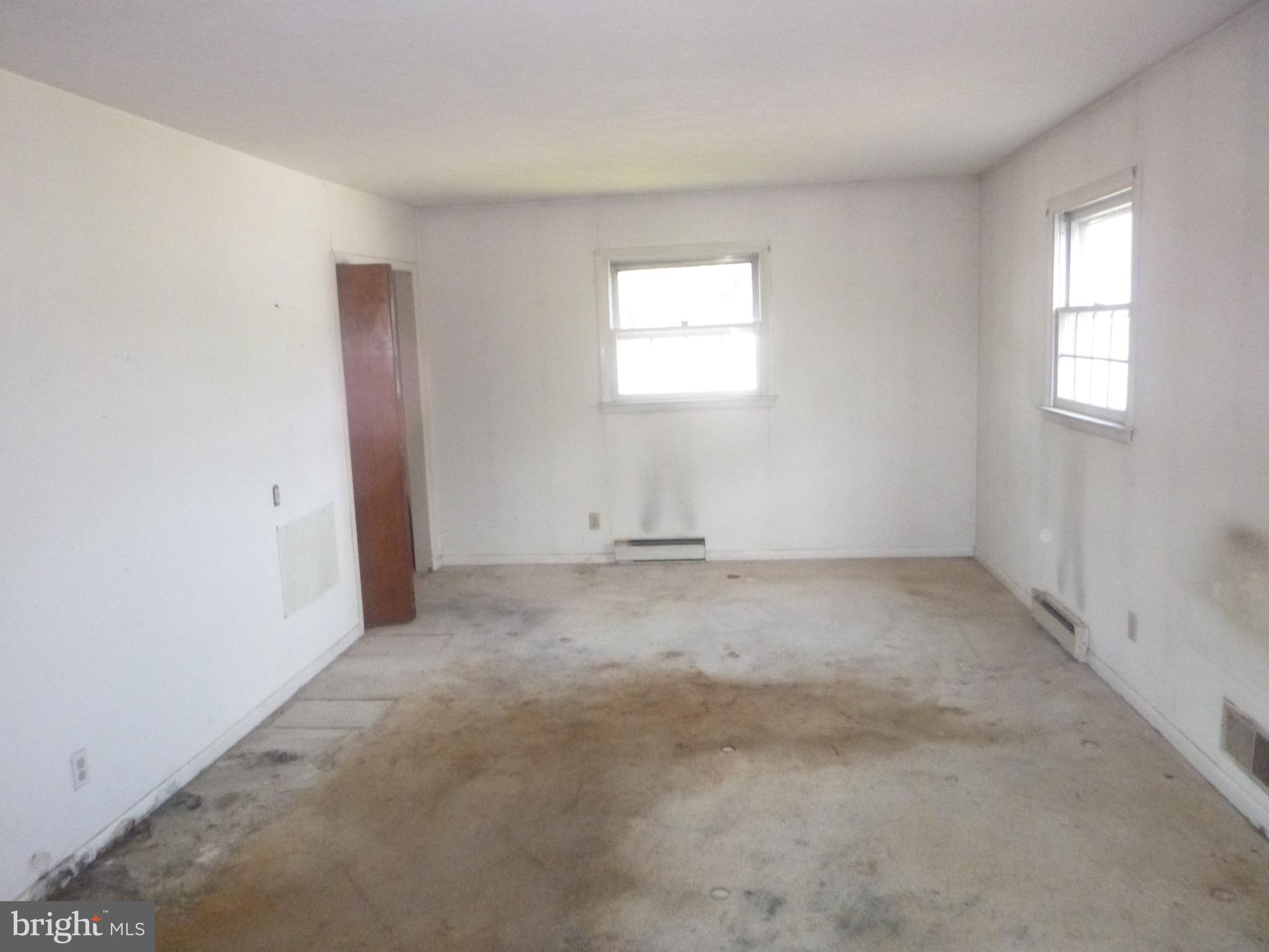 4159 Jacksonville Road Crisfield, MD 21817 - Photo 6 of 12 an empty room with a window