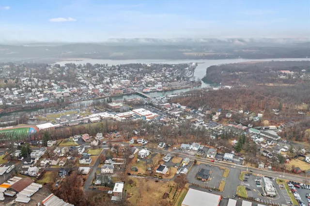 a picture of a bench in front of a building
