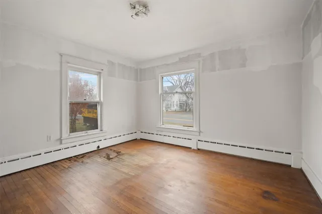 a bathroom with a sink toilet and mirror
